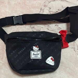 Like new.  Herschel Supply Company Black Belt Bag with Hello Kitty Design